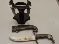 Two ornamental weapons, one with display stand