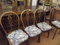Oak refectory style dining table and four wheel ba