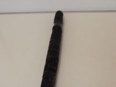 Ebonised carved staff, 90cm