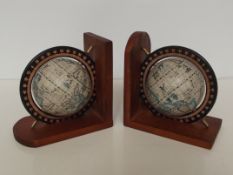Pair of bookends in the form of globes