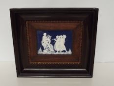 Framed pate-sur-pate plaque