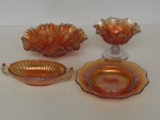 Four items of carnival glass