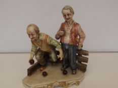 Large Capodimonte group, modelled as two bowlers