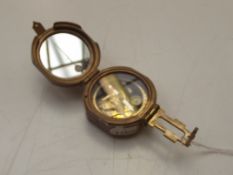 Prismatic compass
