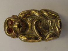 Cast brass spill holder in the form of a monkey, s