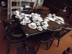Oak dining table and six chairs