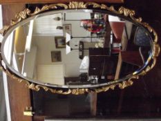 Gilt framed Rococo style mirror by 'Reflectwell'