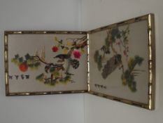 Pair of Oriental silks in simulated bamboo frames