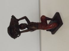 Bronze blackamoor style figure holding shell, heig