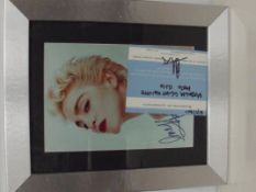 Framed Madonna picture together with signed certif