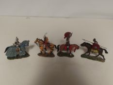 Four Del Prado figures on horseback