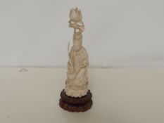 Early 20th ivory figure on plinth base, height 26c