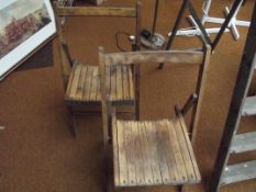 Pair of wooden folding chairs