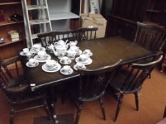 Oak dining table and six chairs