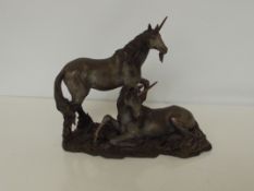 Resin group modelled as two unicorns