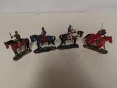 Four Del Prado figures on horseback