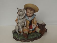 Bisque group, boy with dog