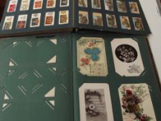Collection of postcards and cigarette cards