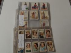 Three sets of cigarette cards
