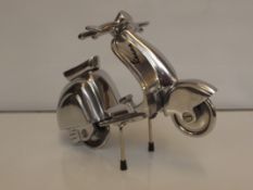 Chrome Vespa scooter