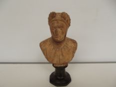 Stone carving of Dante on a plinth