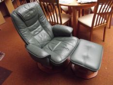 Green leather swivel chair with footstool