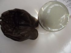 Crystal ball on a stand in the form of a hand