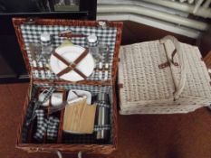 Cased picnic set together with a picnic basket