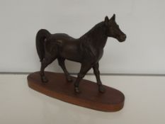 Heavy bronze horse on plinth
