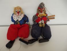 Two vintage string puppets