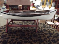 Coffee table in the form of a rowing boat