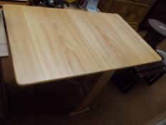 Drop leaf light wood breakfast table