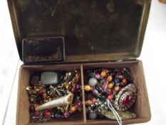Brass box with costume jewellery