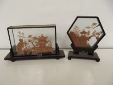 Two Oriental cased cork work