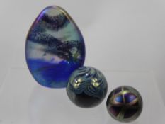 A Glasform Paper Weight by J. Bickfield, together with an Isle of Wight glass paper weight, an