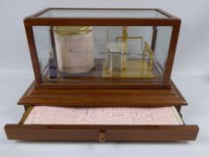 A Mahogany Cased Barograph by Thorpe & Mason London, the barograph having original ink bottle and