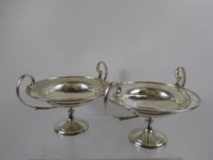 A Pair of Twin Handled Bon Bon Dishes, on pedestal bases, London hallmark dd 1911, approx wt 1080