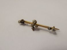 An Antique 9ct Gold and Rose Cut Diamond Brooch, the brooch in the form of a four leaf clover;