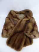 A Lady's Mink Stole, size medium.