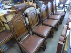 An Oak Extending Dining Room Table, together with five dining chairs and one carver. The dining