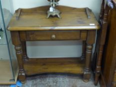 A Stained Pine Table, with single drawer and straight stretchers 78 x 33 x 65 cms together with a