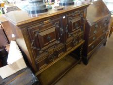 A Shoolbred & Co., Stained Oak Cupboard, raised on barley twist legs with straight stretchers with