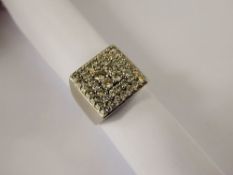 A Gentleman's 18 ct White Gold and Diamond Cluster Ring, approx 88 pts dias, size N, approx 12 gms.