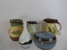 Quantity of Studio Pottery, including three glazed jugs, blue glaze jar and cover, a High Bank