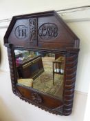 A Mahogany Framed Hall Mirror, the mirror carved with monogram IH and dated 1708 to the upper