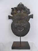 Bamileke Cameroon Antique Cast Copper Alloy/Bronze Mask, depicting an elated character,