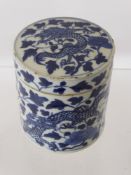 A 19th Century Blue and White Canister and Cover, depicting a dragon amongst foliage, approx 11.5