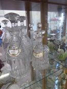 Miscellaneous Glass Decanters, together with four porcelain labels.