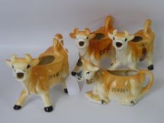 A Collection of Seven Porcelain Creamers, including Tony Wood, Staffordshire England, five 