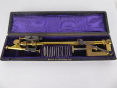 An Antique French Brass Travelling Microscope, with a small quantity of lens by Mon. Baraban, 175